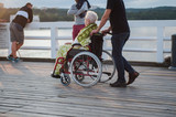 Fototapeta  - starsza kobieta na wózku inwalidzkim