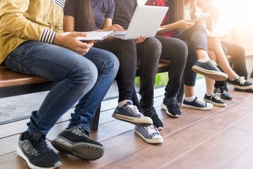 young people being used computer and tablet. education and technology concept