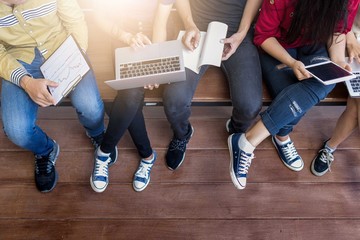 young people being used computer and tablet. education and technology concept