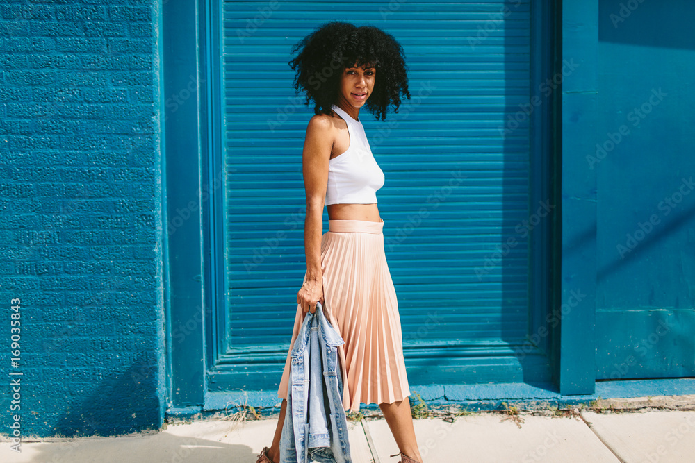 Portrait of a beautiful young black woman posing outdoors Stock Photo ...