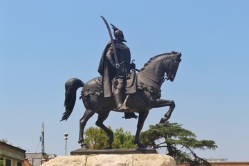 Statue of Skanderbeg or Gjergj Kastrioti who fought against the empire in the 15th century. On the Skanderbeg square in the center of Tirana, Albania, Europe.