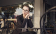 © xo4uphoto - Sad business woman sitting in the cafe
