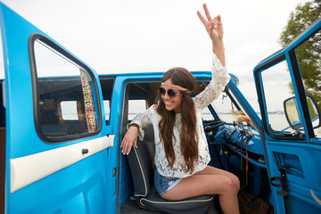 Sticker - happy hippie woman showing peace in minivan car