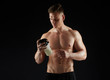 © Syda Productions - young man or bodybuilder with protein shake bottle
