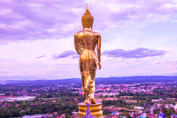 Poster - Walking buddha statue at Phra That Khao Noi temple