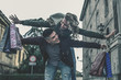 © liderina - Couple in shopping together. Happy couple shopping together and having fun. Boyfriend carrying his girlfriend on the piggyback.