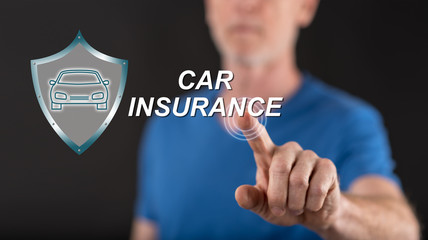 Poster - Man touching a car insurance concept on a touch screen