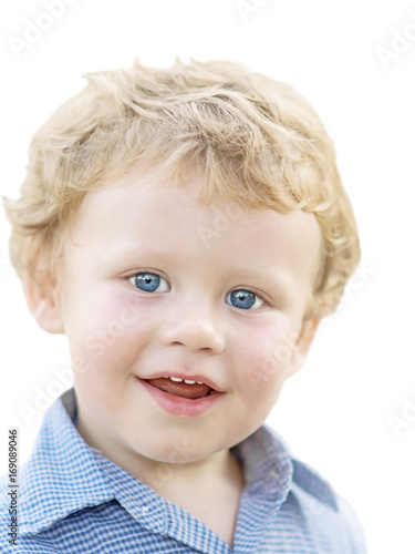 Portrait Of A Beautiful Smiling Small Blonde Boy With Big Blue