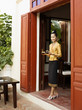 © Matthew Wakem - Waitress serving espresso and sweets, Restaurant Les 3 Nagas..Luang Prabang, Laos.