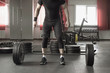 © lenblr - close up of man doing deadlift exercise in gym.