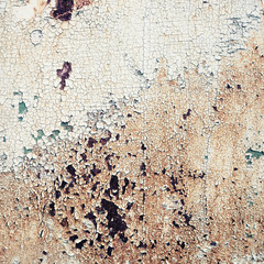 Wall Mural - Old peeling paint texture with cracks and rust spots. Grunge background.