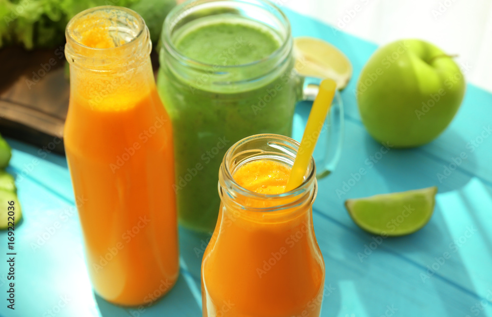 Fresh smoothies in glassware on table
