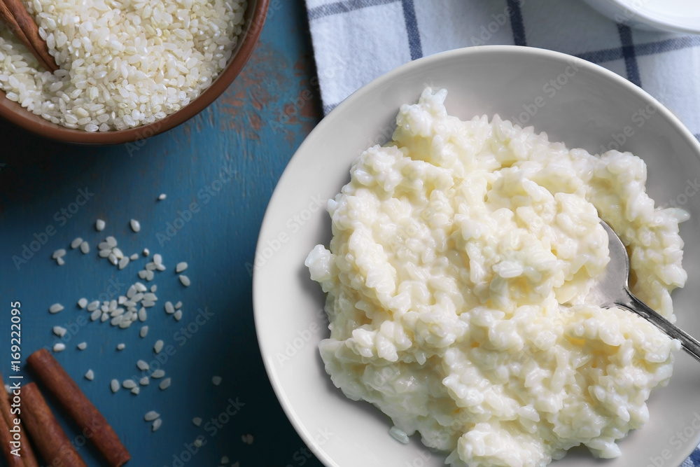 Delicious rice pudding in bowl on kitchen table