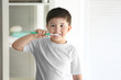 © Africa Studio - Cute little boy cleaning teeth at home