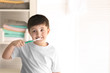 © Africa Studio - Cute little boy cleaning teeth at home