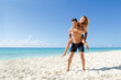 © Guajillo studio - Couple piggyback ride at the beach