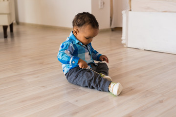 Wall Mural - African American baby boy indoors