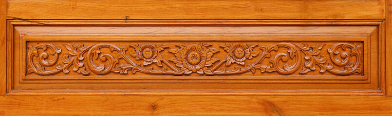 Wall Mural - Pattern of flower carved on wood background, Thai style.