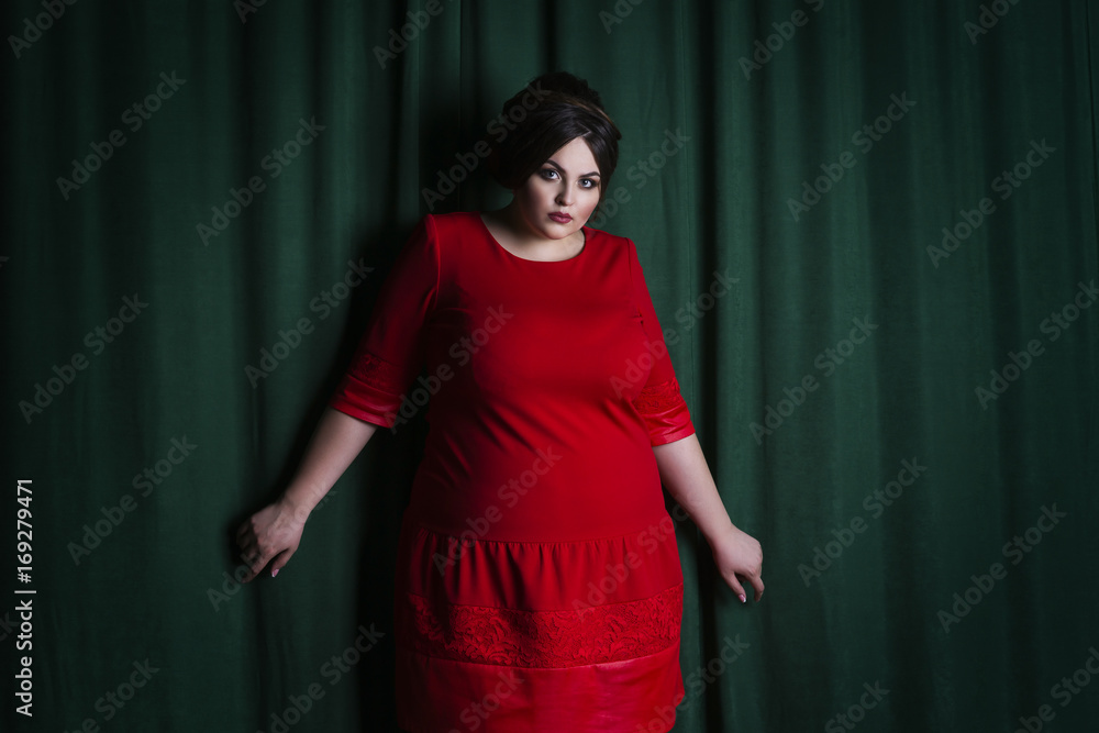 Plus size model, fat woman in red evening dress Stock Photo | Adobe Stock