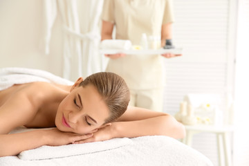 Canvas Print - Young beautiful woman relaxing in spa salon