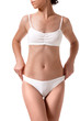 © nazarovsergey - Slim tanned woman's body. Isolated over white background.