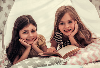 Wall Mural - Little girls playing