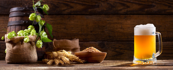 Poster - Mug of beer with green hops and wheat ears