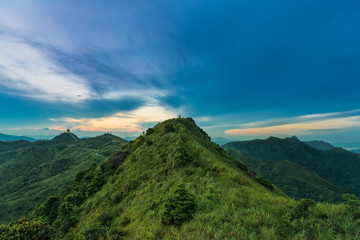 Wall Mural - Mountain valley during sunset. Natural summer landscape in hong kong