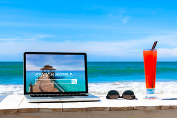 Search hotels website on computer screen, online booking concept