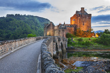 Eilean Donan Castle, Scotland, Reflecting Itself Into The Water During Evening.