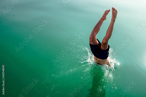 Diving and jumping from a boat at Balaton lake in Hungary Obraz na płótnie