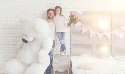 Wall Mural - Charming cheerful family ready for greeting their mom