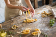 © Jane Lane - Raw homemade pasta and hands