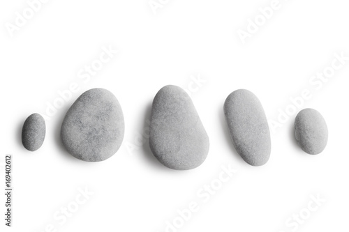 Cuadros en Lienzo Grey pebbles on white background