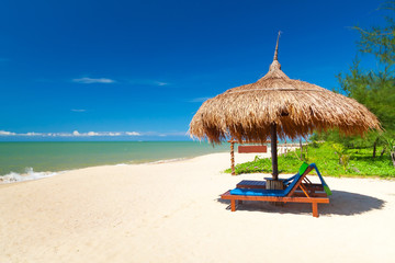 Poster - Tropical beach scenery with parasol in Thailand