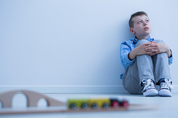 Wall Mural - Boy starring at wall