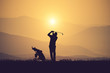 silhouette of golfers hit sweeping and keep golf course in the summer for relax time.Vintage color