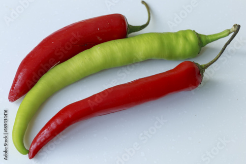 Foto-Schmutzfangmatte - Vegan food. Fresh Hot Сolorful Pepper, isolated on white background (von Dmitrii)