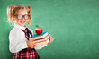 © Romolo Tavani - Little Schoolgirl Holding Books And Apple