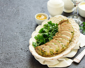 Canvas Print - Baked pork tenderloin in herbs, with mashed potatoes and garnish.