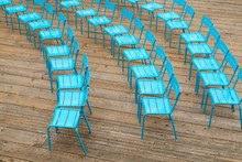 Blue Metal Chairs On Wood Deck