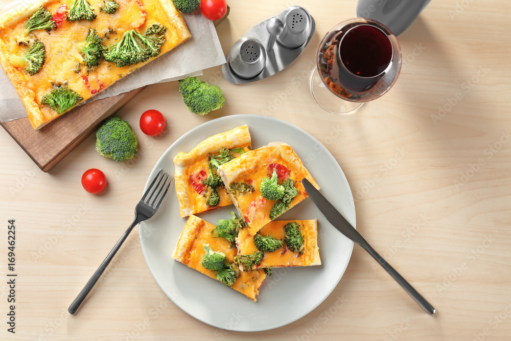 Traditional quiche with broccoli and cheese on plate