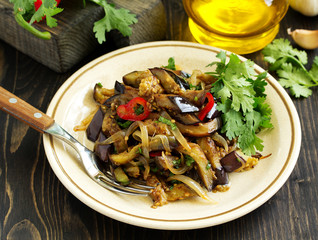 Wall Mural - Salad of fried eggplant with onion and garlic. Georgian cuisine.