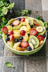 Wall Mural - Big bowl with fruit salad