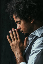 Side View Of Man Praying