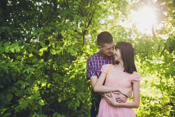 young couple in love together on nature