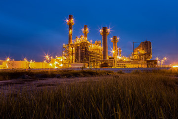 Gas turbine electric power plant at night
