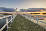 Fototapeta Pomosty - Sunset on the lake, wooden, white pier