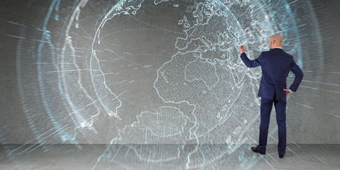 Wall Mural - Businessman using digital planet earth interface on a wall 3D rendering
