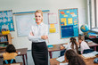 © LIGHTFIELD STUDIOS - beautiful young teacher in class